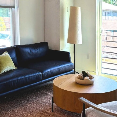a living room with a couch and a coffee table
