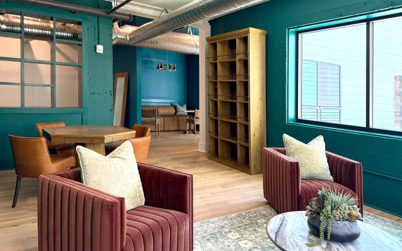 a room with chairs and tables