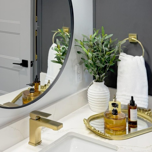a bathroom with a large mirror